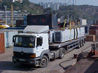 Unloading of cargo onto company's hauler