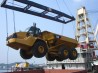 Trans-loading of tractor to Wangfoong No. 10 for transshipment to Mainland China