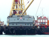 Wangfoong 9 is lifting container by using its derrick